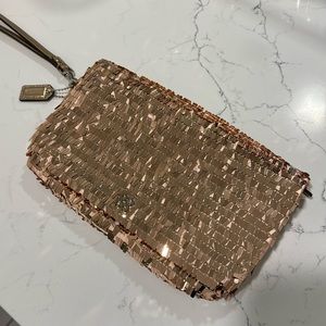 Rose gold sequin coach wristlet